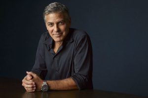 George Clooney wears the 42 mm copy Omega Speedmaster Moonwatch 311.30.42.30.01.005.